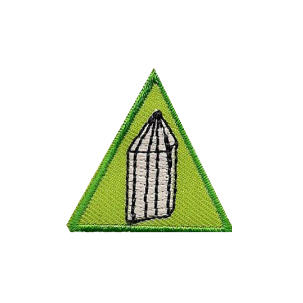 A green triangle with a picture of a pencil on it badge.