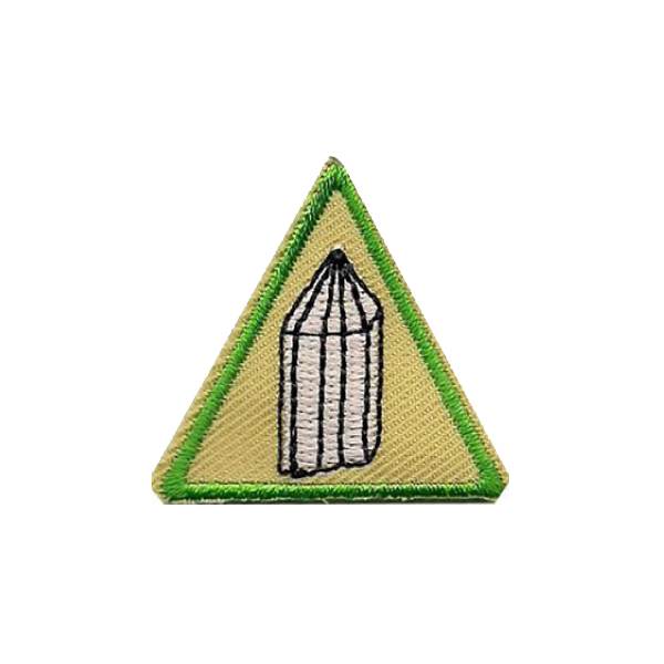 A triangle with a picture of a pencil on it badge.