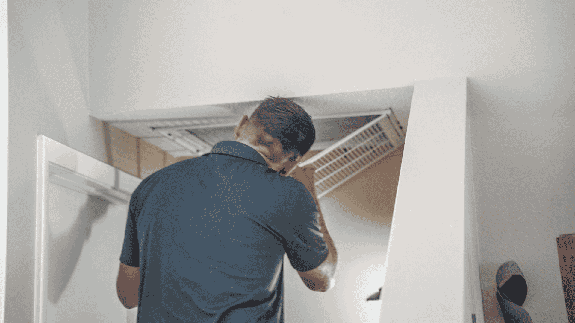 Contractor performing Air Duct Cleaning