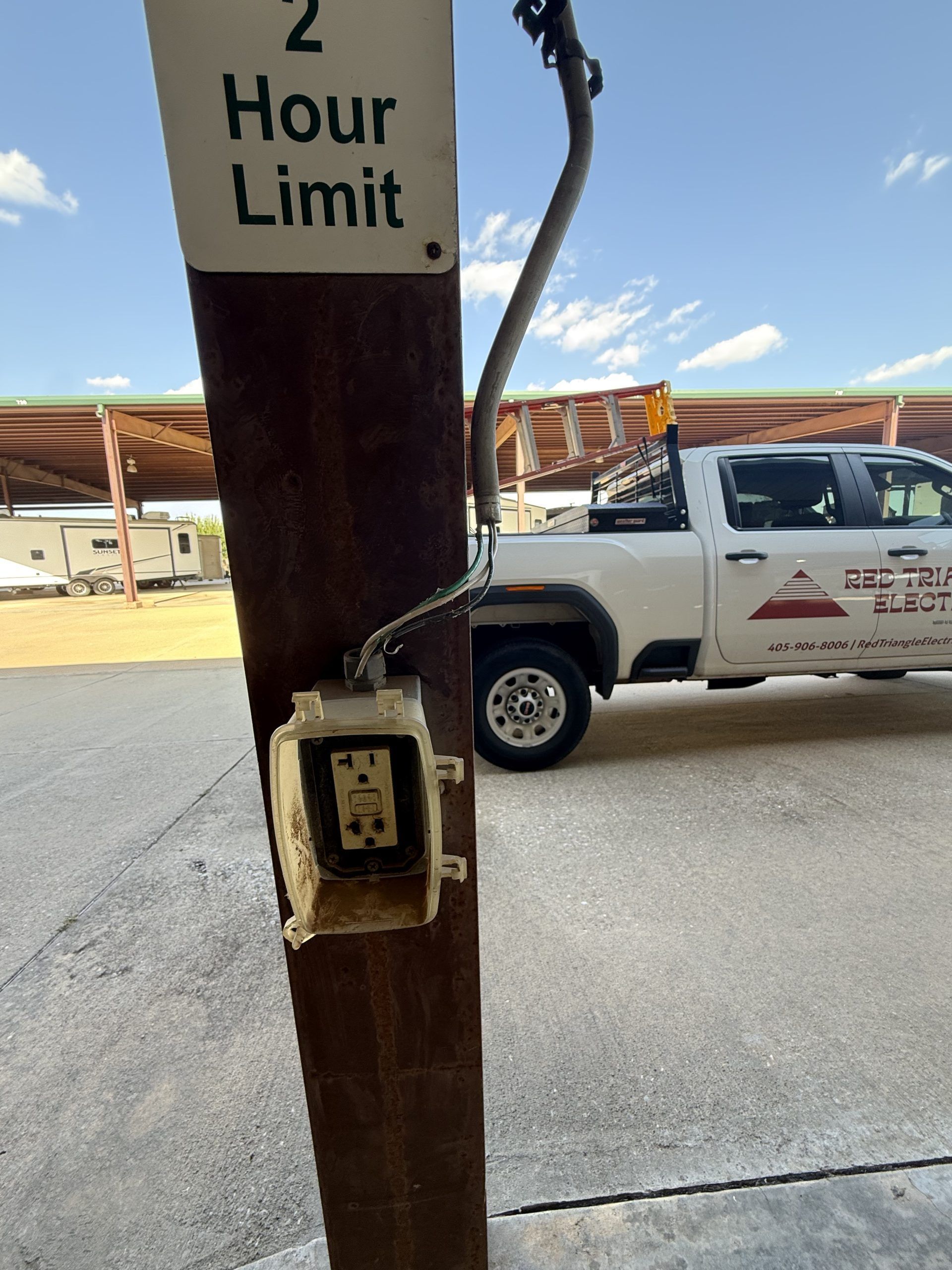 A vertical wooden post with a 