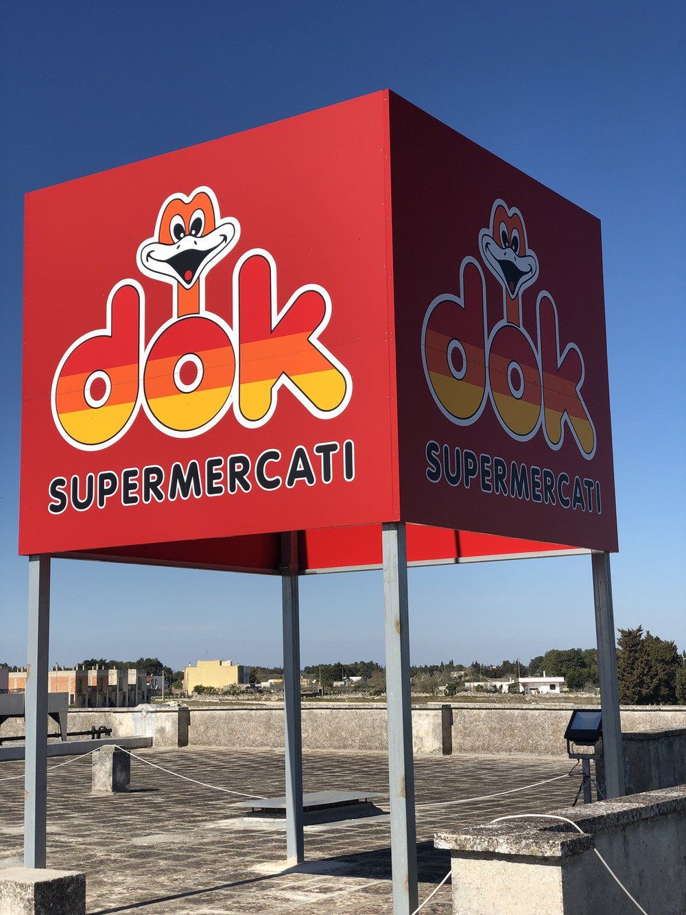 insegna dok