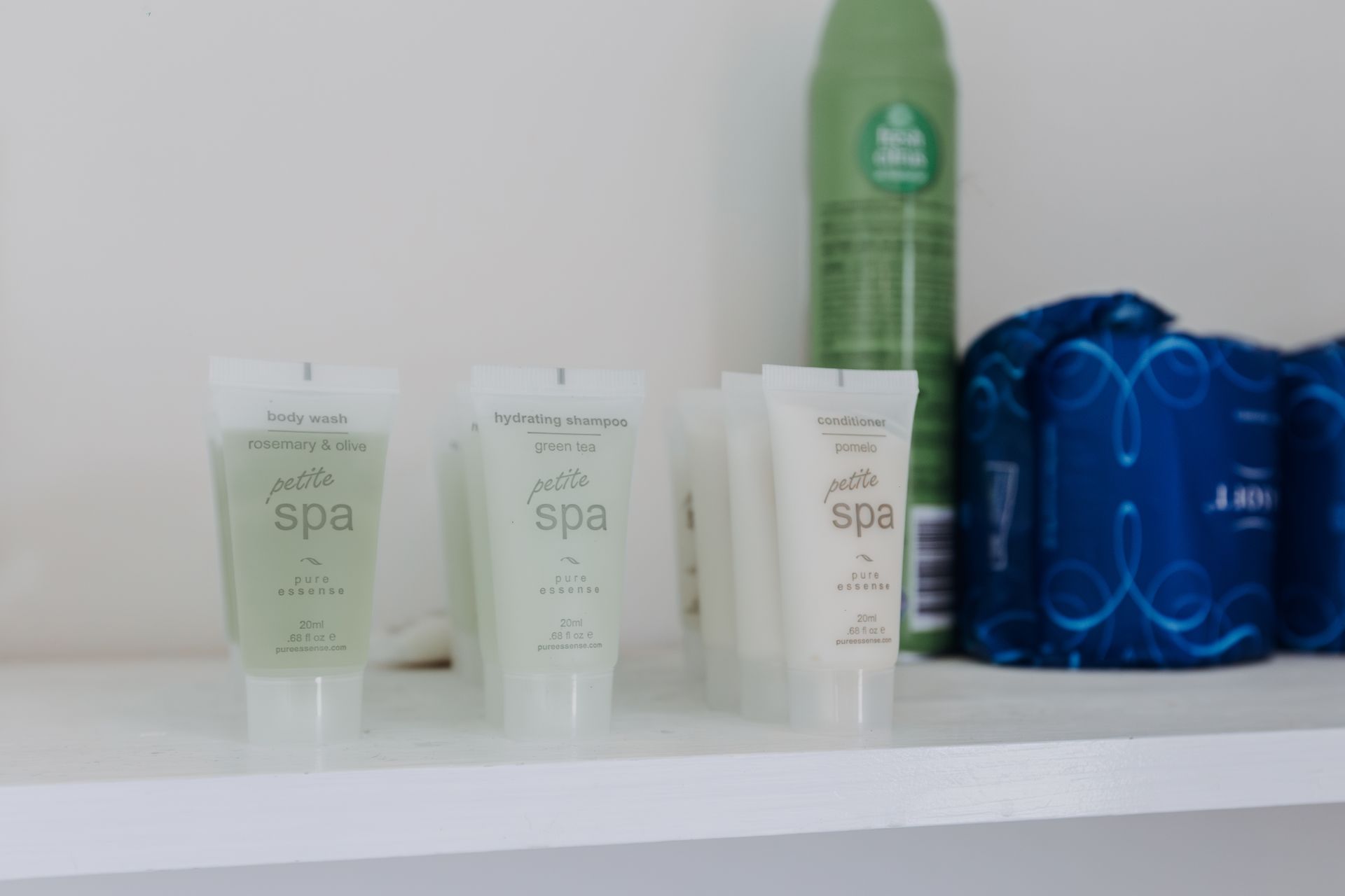 Small travel-sized bottles labeled 
