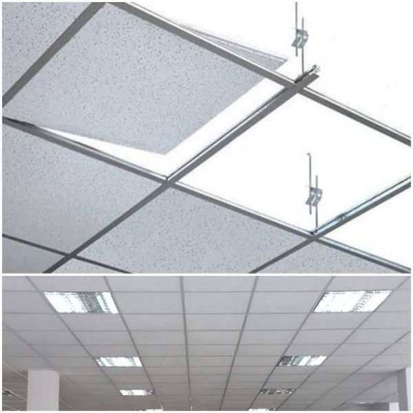 Paneles de techo suspendidos y luces fluorescentes en la estructura del techo de una oficina, con un panel desplazado.