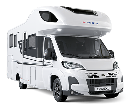White Adria Coral XL motorhome with black accents parked on white.