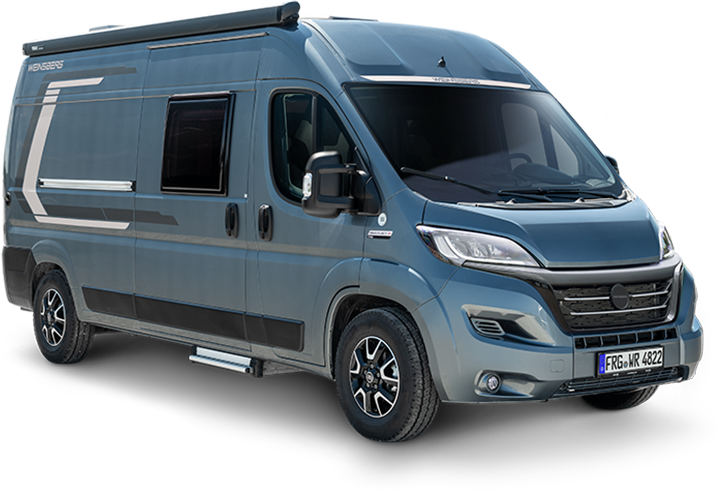 Blue camper van with awning, parked outdoors.