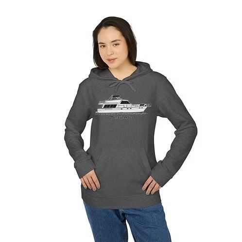 Woman wearing a dark gray hoodie with a white yacht graphic, standing against a plain white background
