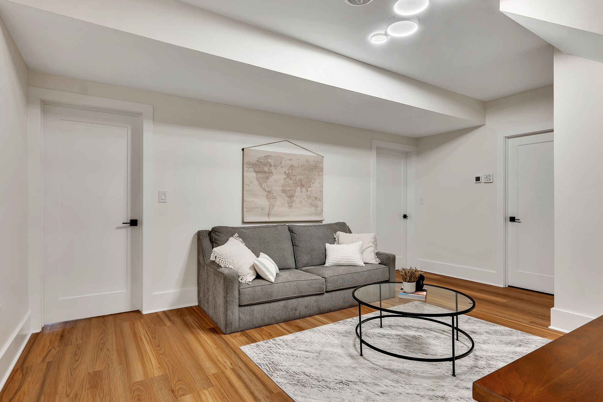 There is a couch and a coffee table in the living room.
