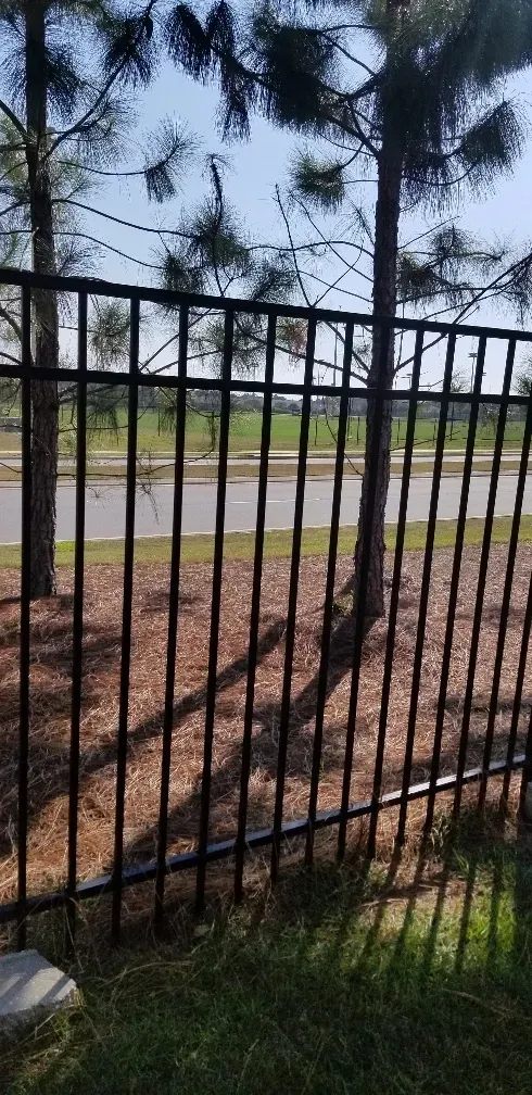 Backyard fencing project in Baldwin County completed by Mitchell Fence Company