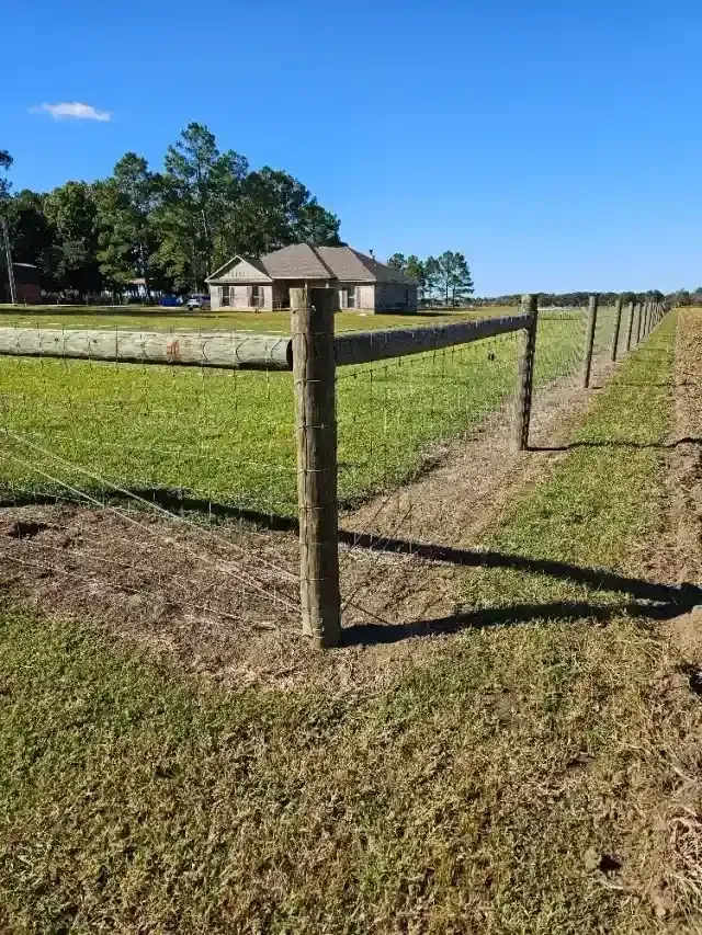 Mitchell Fence in-house crew completing a residential fence installation in Baldwin County, AL