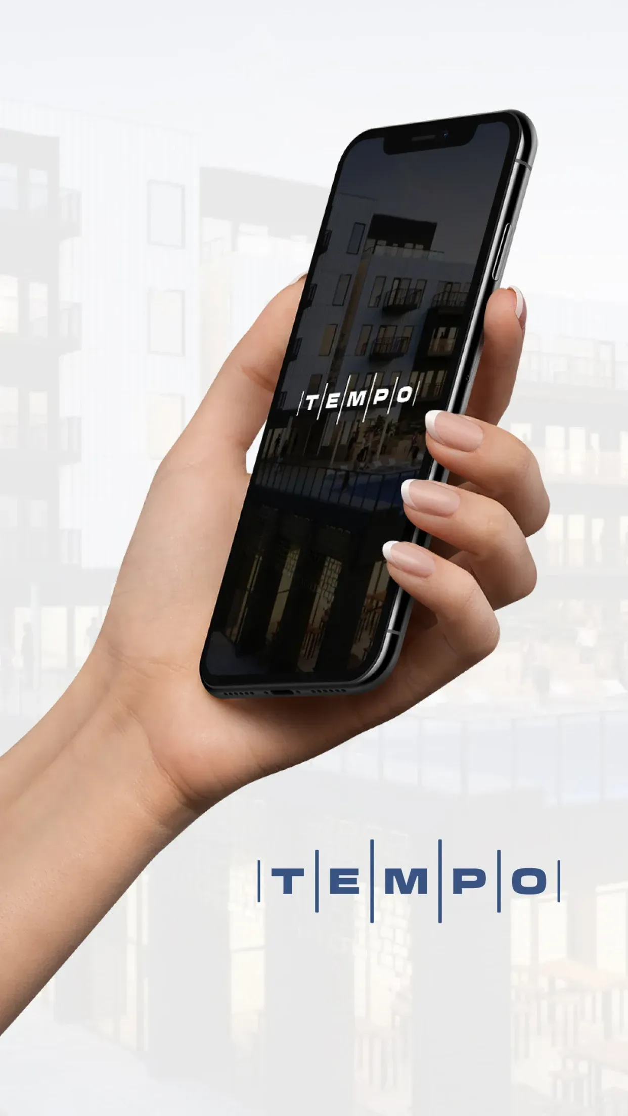 Hand holding a smartphone with the word