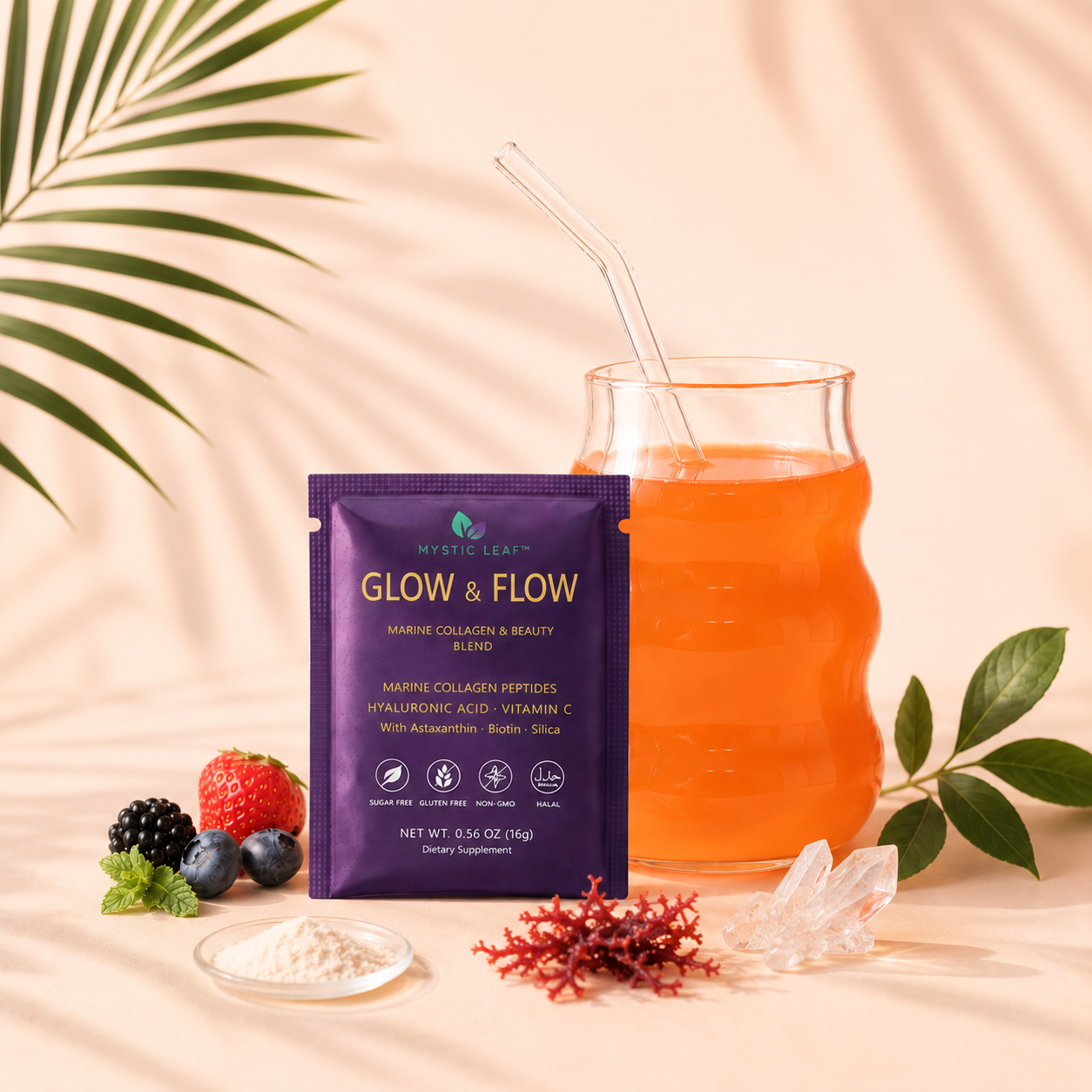 Purple “Glow + Flow” drink packet beside orange beverage with fruit and herbs on a beige backdrop