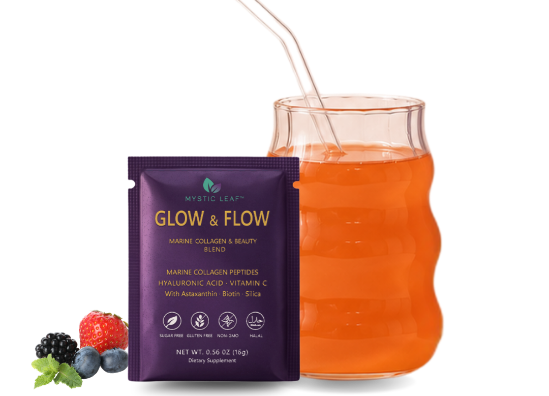 Purple Glow & Flow drink mix pouch beside an orange beverage in a glass with berries nearby