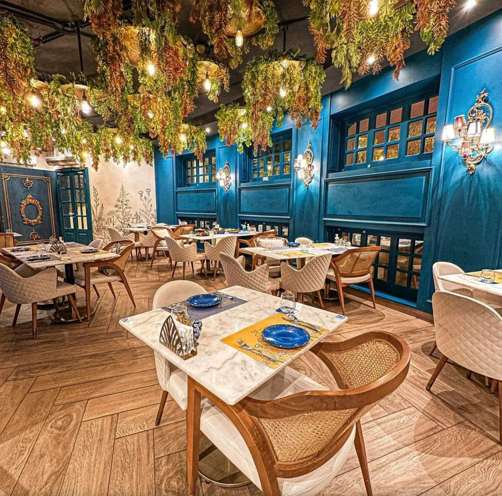 Outdoor café terrace in Maadi with greenery and relaxed seating