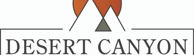 Logo for Desert Canyon, featuring mountains and the text 