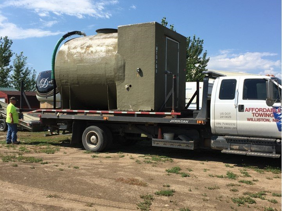 towing a car - towing service in Williston, ND