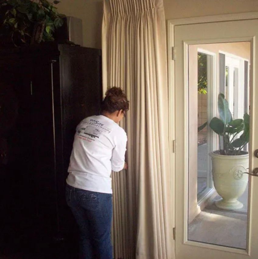 A woman in a white shirt that says ' florida ' on it