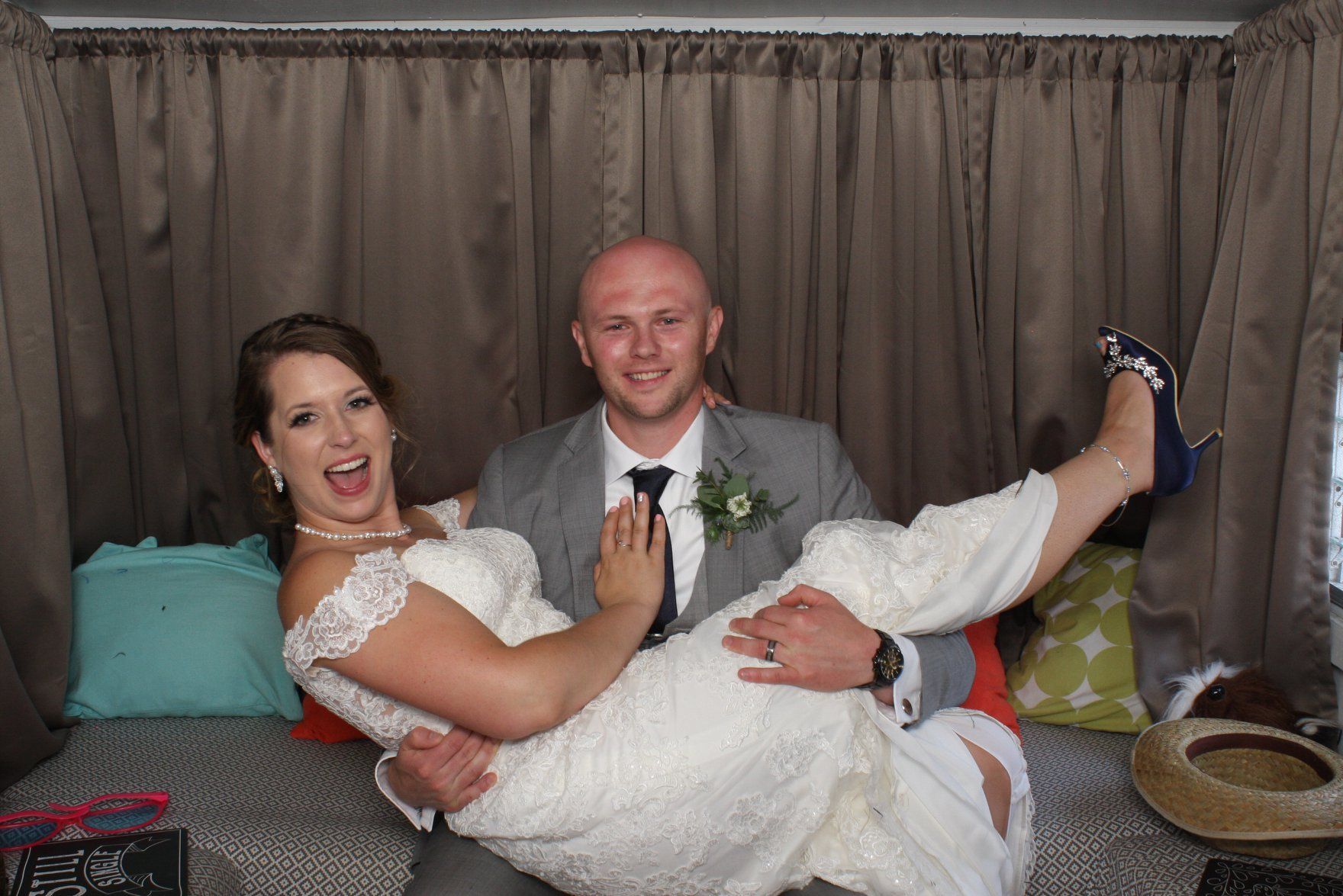 groom lifting bride