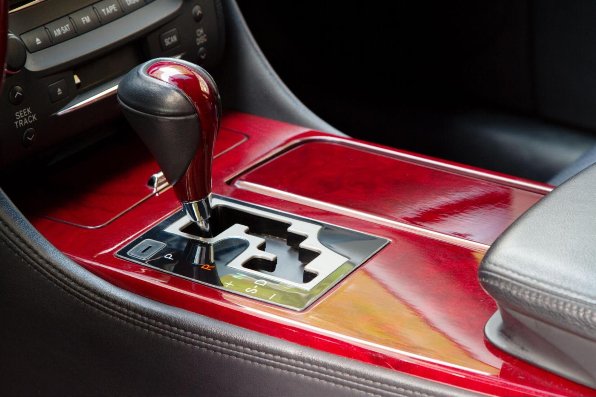 A close up of a shifter in a car