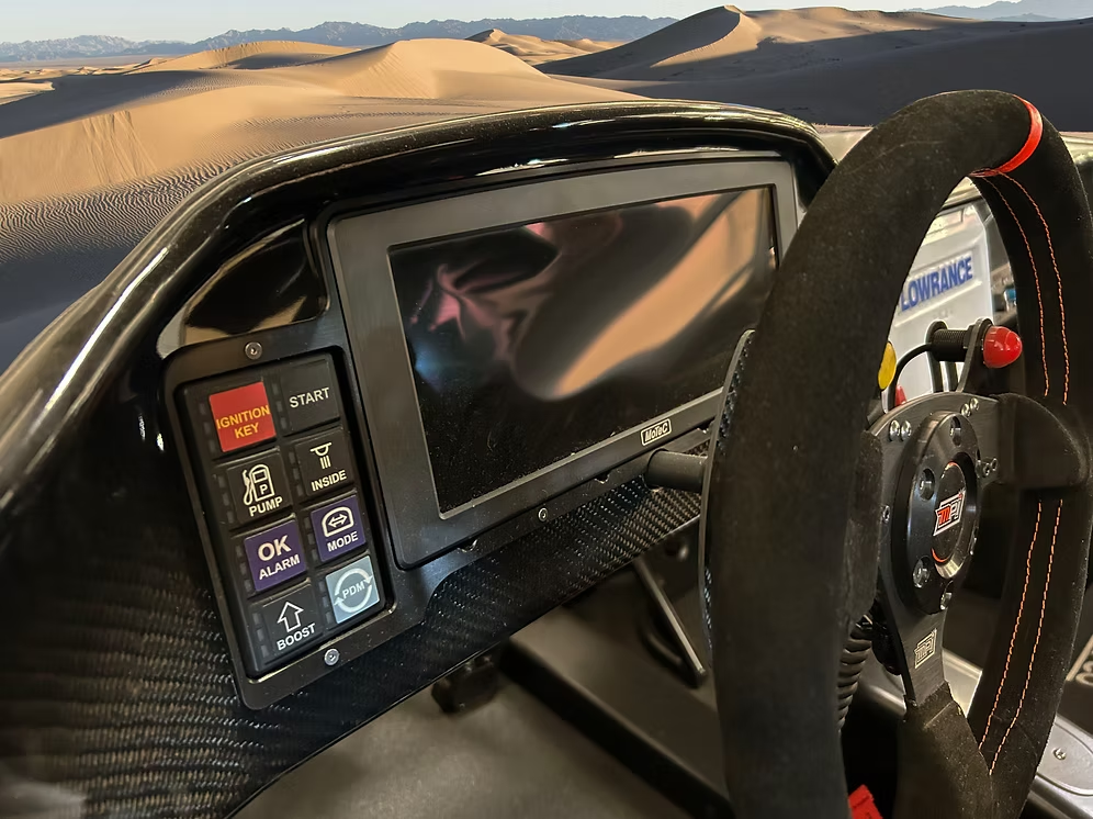 Dashboard of an off-roading vehicle with dash mounts attached to it using a combo bezel unit from Precision Metal Craft.