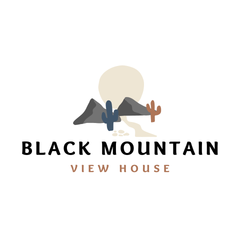 Logo for Black Mountain View House featuring two dark mountains, a desert sun, a path, and two cacti.