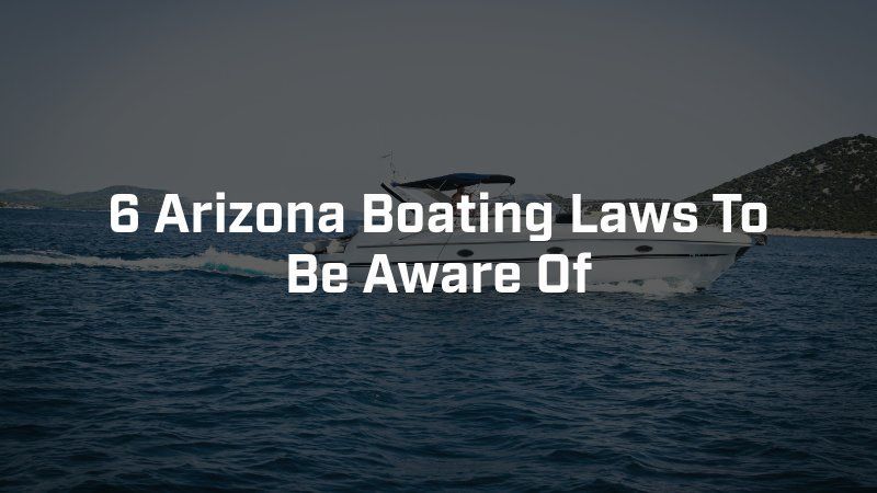 A white motorboat on dark water with the text