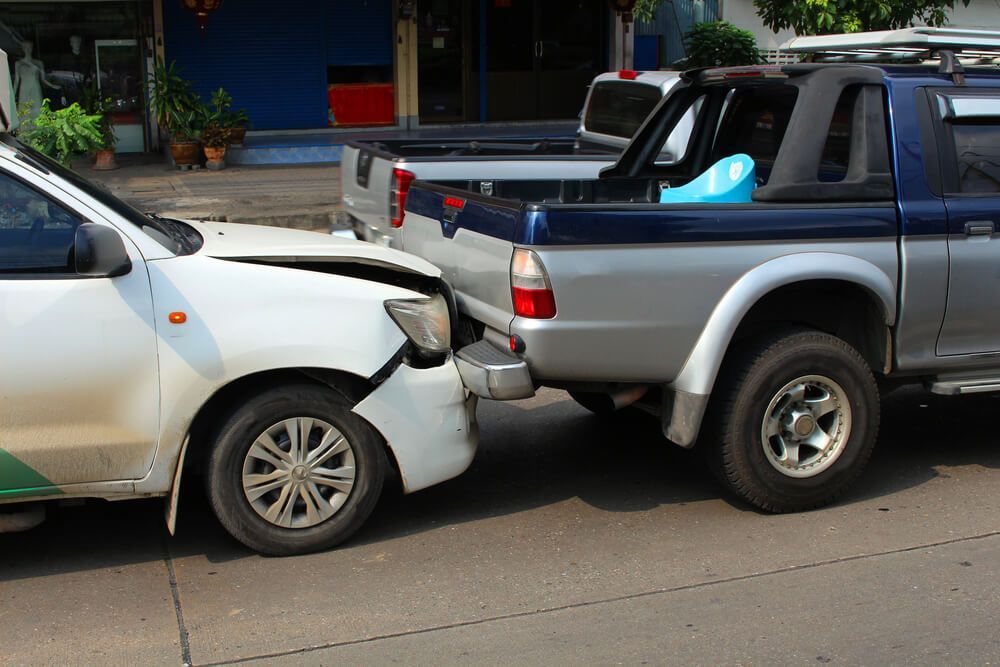 What is the average payout for a rear-end collision in Phoenix?