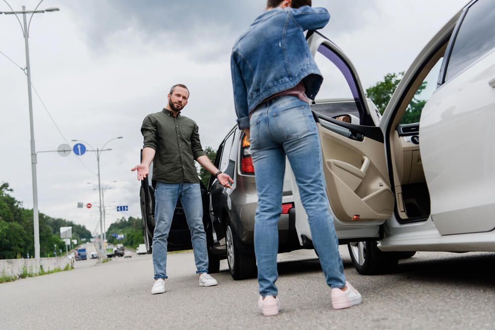 What do I do if I get in an accident driving someone else's car?