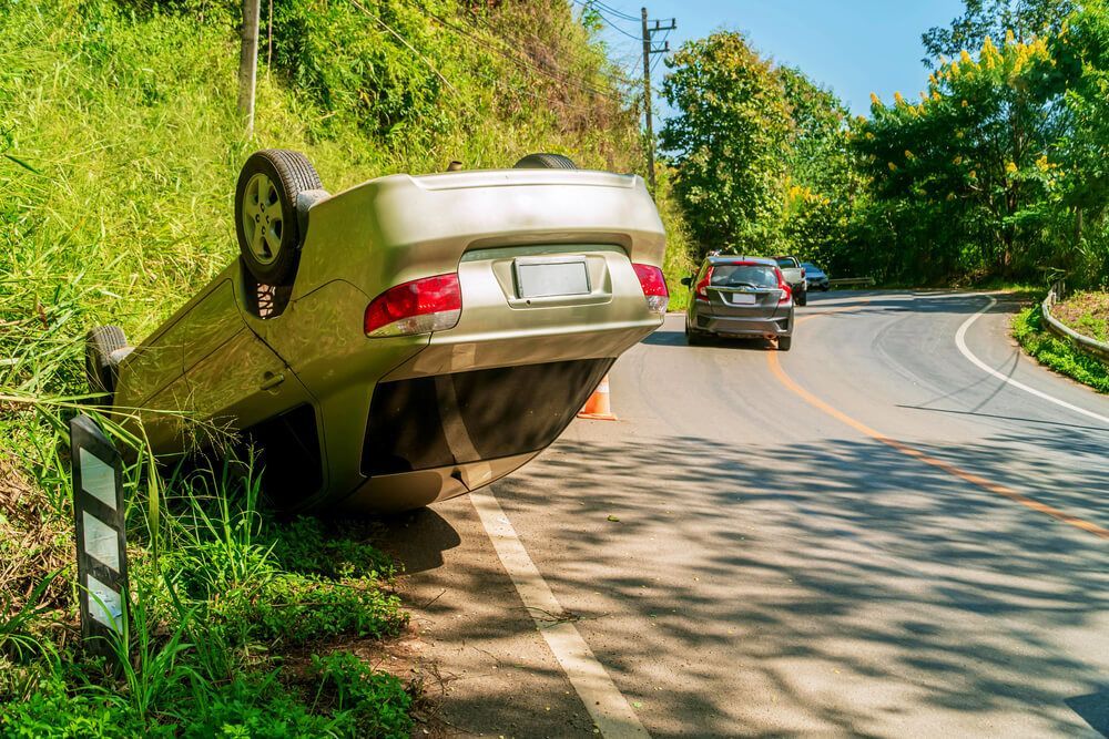 What should I do after a rollover accident?