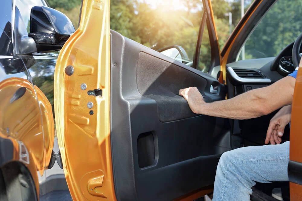 Who is at fault if someone opens their car door and you hit it?