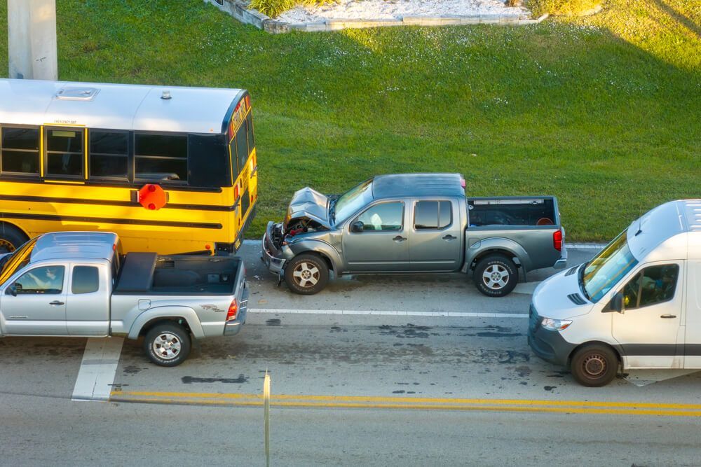 What are the most common causes of school bus accidents?