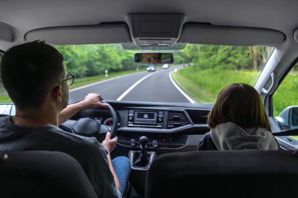Whenis it safe for a kid to sit in the front seat?