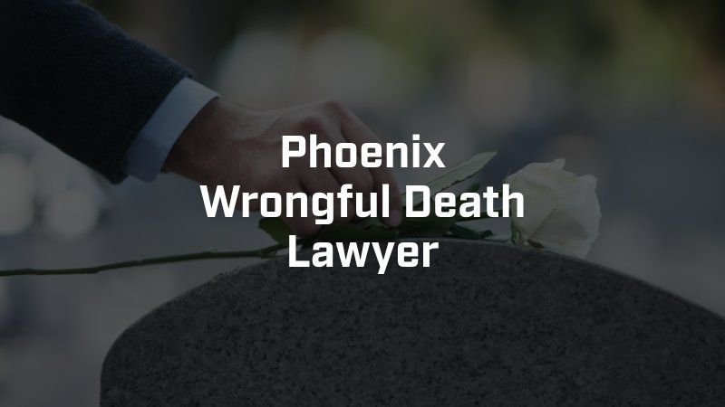 A hand places a white rose on a tombstone. Text overlay reads: Phoenix Wrongful Death Lawyer.