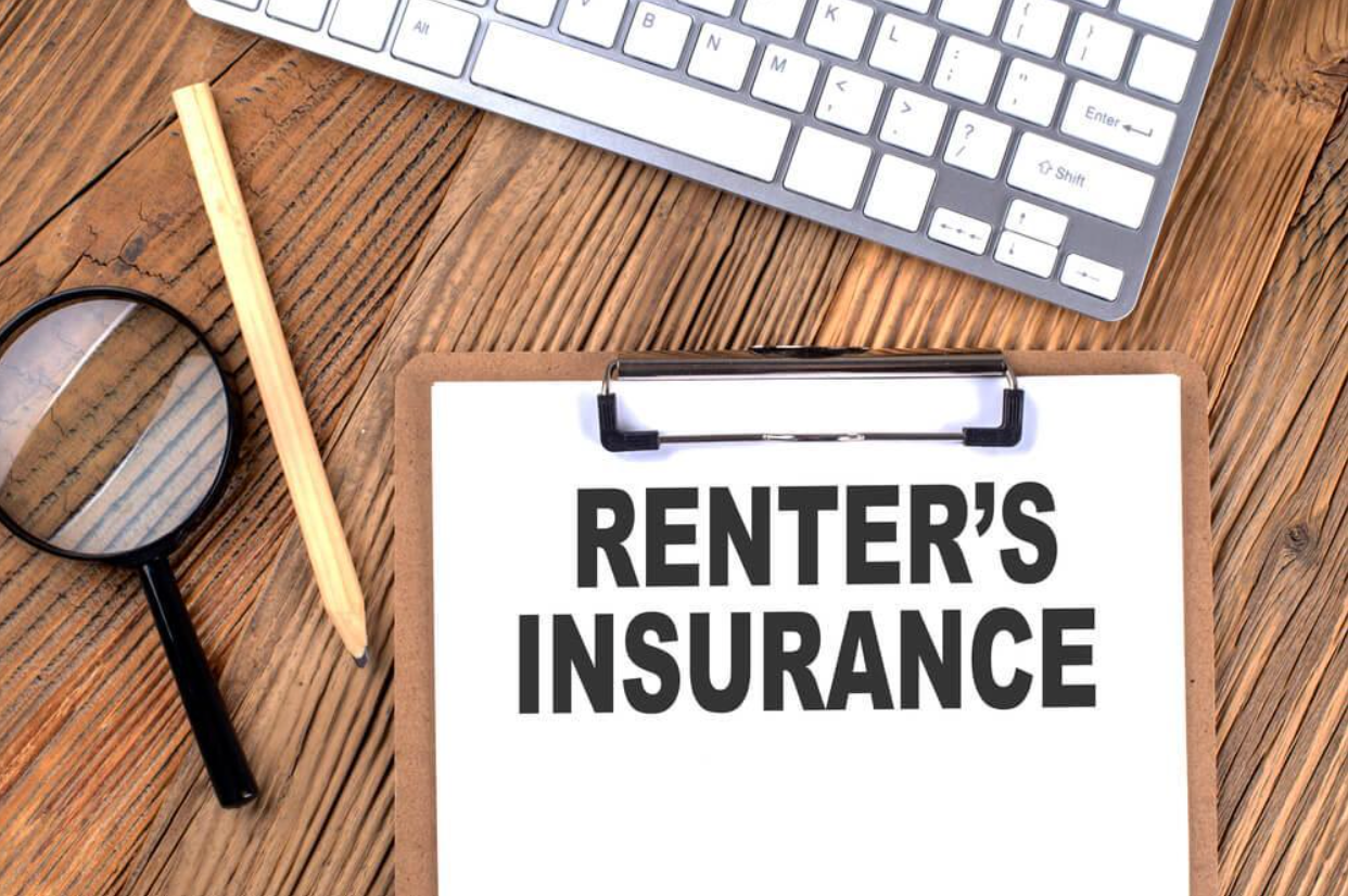 A clipboard with the words `` renter 's insurance '' written on it.
