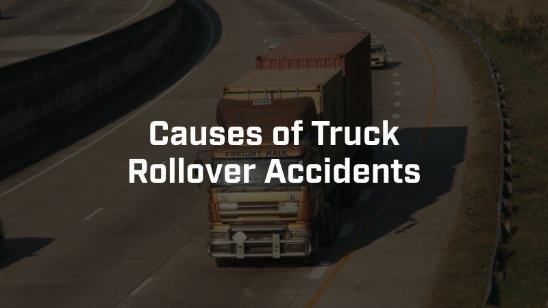 A truck drives on a curved highway with the text 