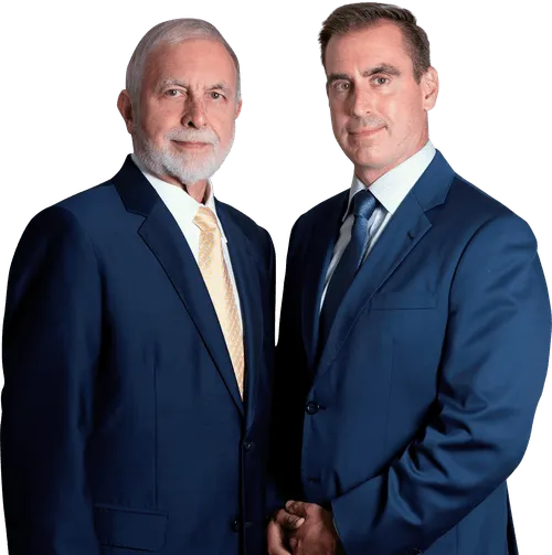 Two men in blue suits standing together against a white background