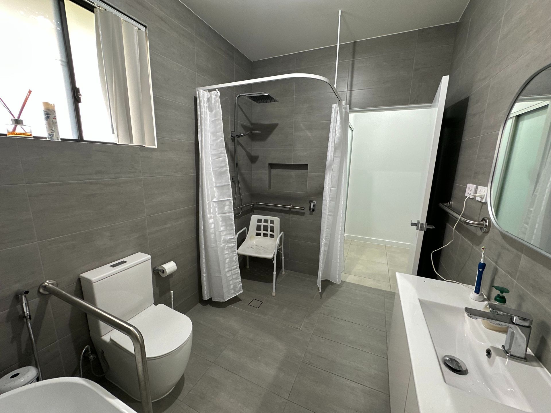 Accessible Bathroom With Shower, Toilet, and Sink — My Coast Projects in West Gosford, NSW