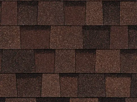 Close-up of brown shingle roofing with overlapping rectangular tiles.