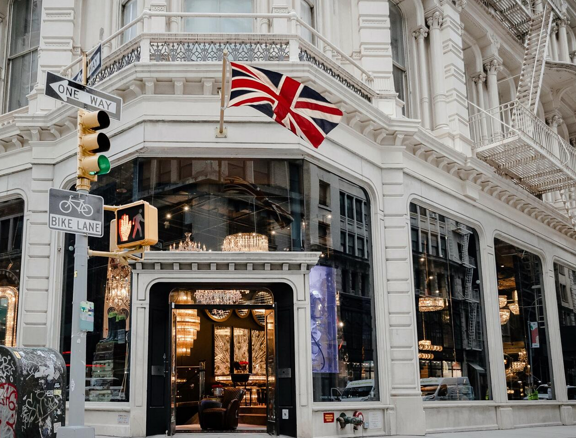 a store front with a british flag on top of it .