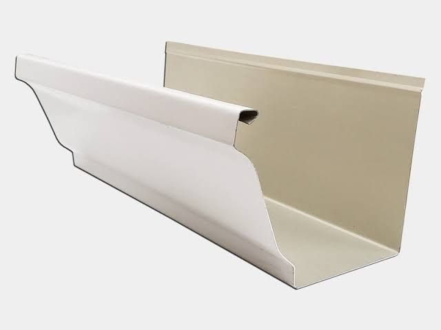 White and beige vinyl gutter hanging straight down, shown in profile on a white background