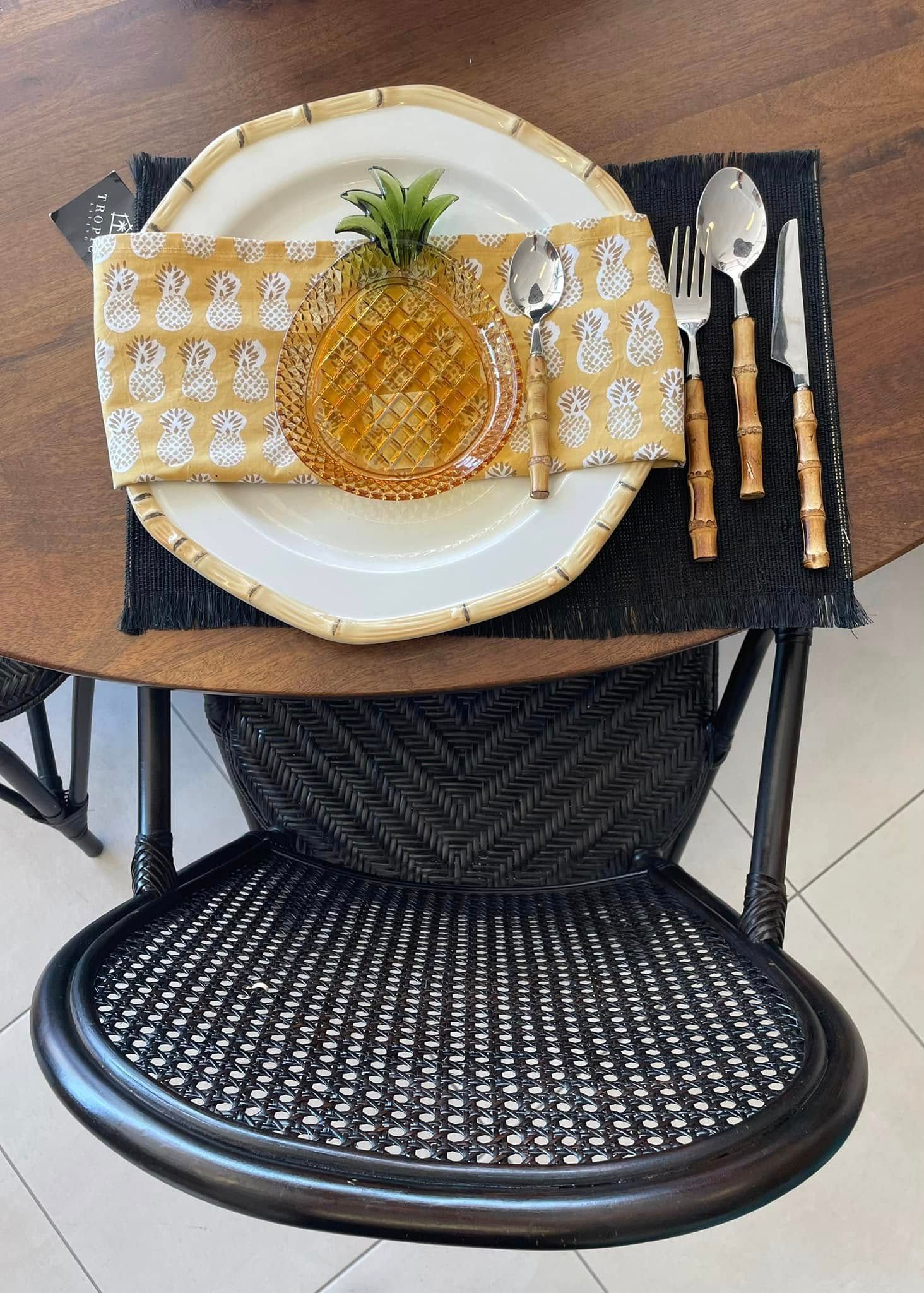 Pineapple Dessert on a White Plate With Two Waffles and Utensils on a Café Tray Table — Tropic Living in Trinity Beach, QLD