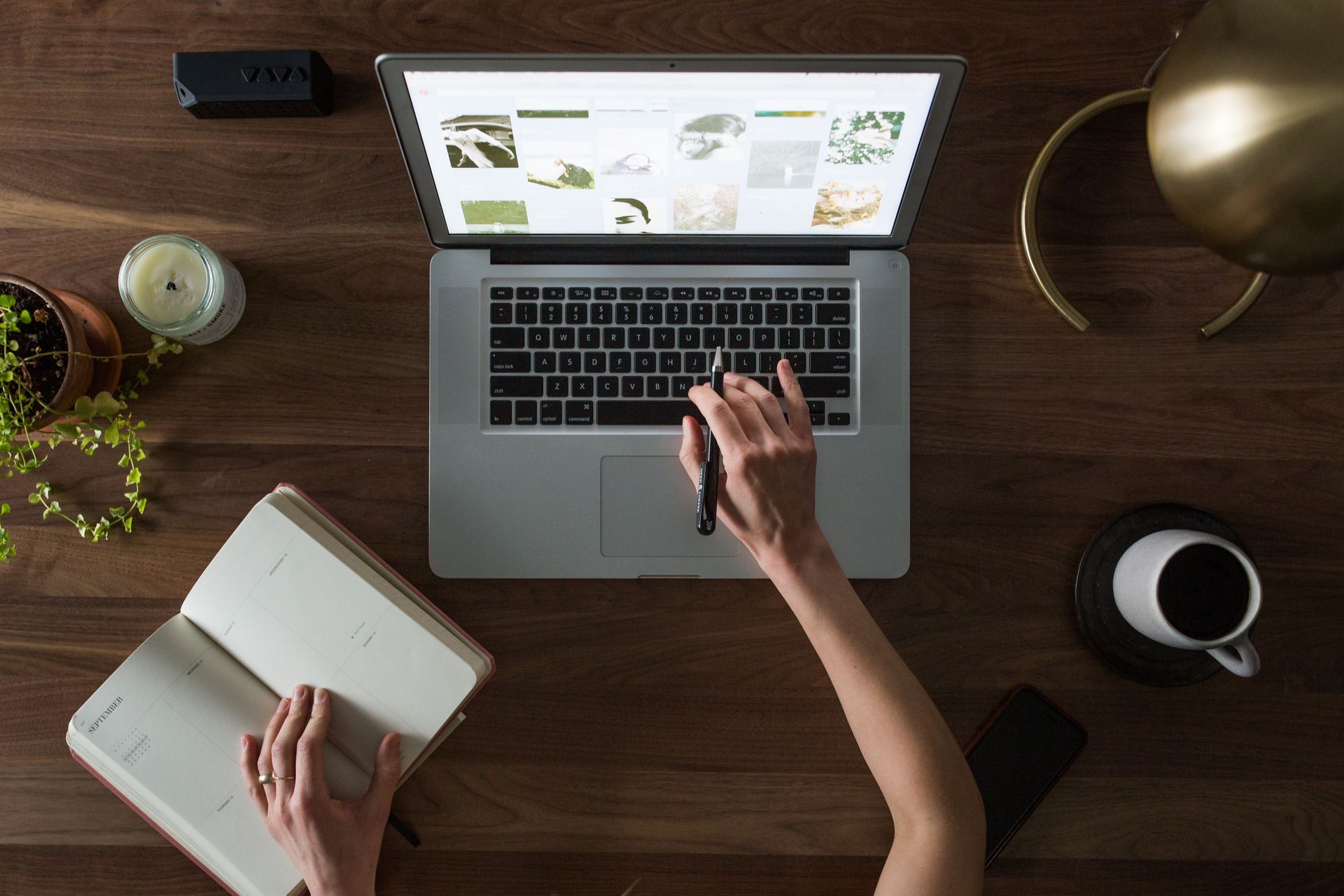 web designer using a laptop to create a new website