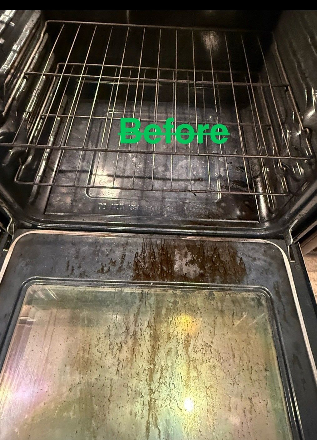 Dirty oven interior with racks and door, labeled 