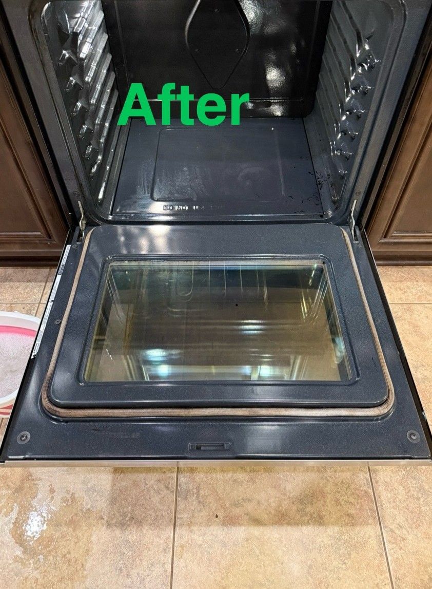 Clean oven interior with the door open, labeled 