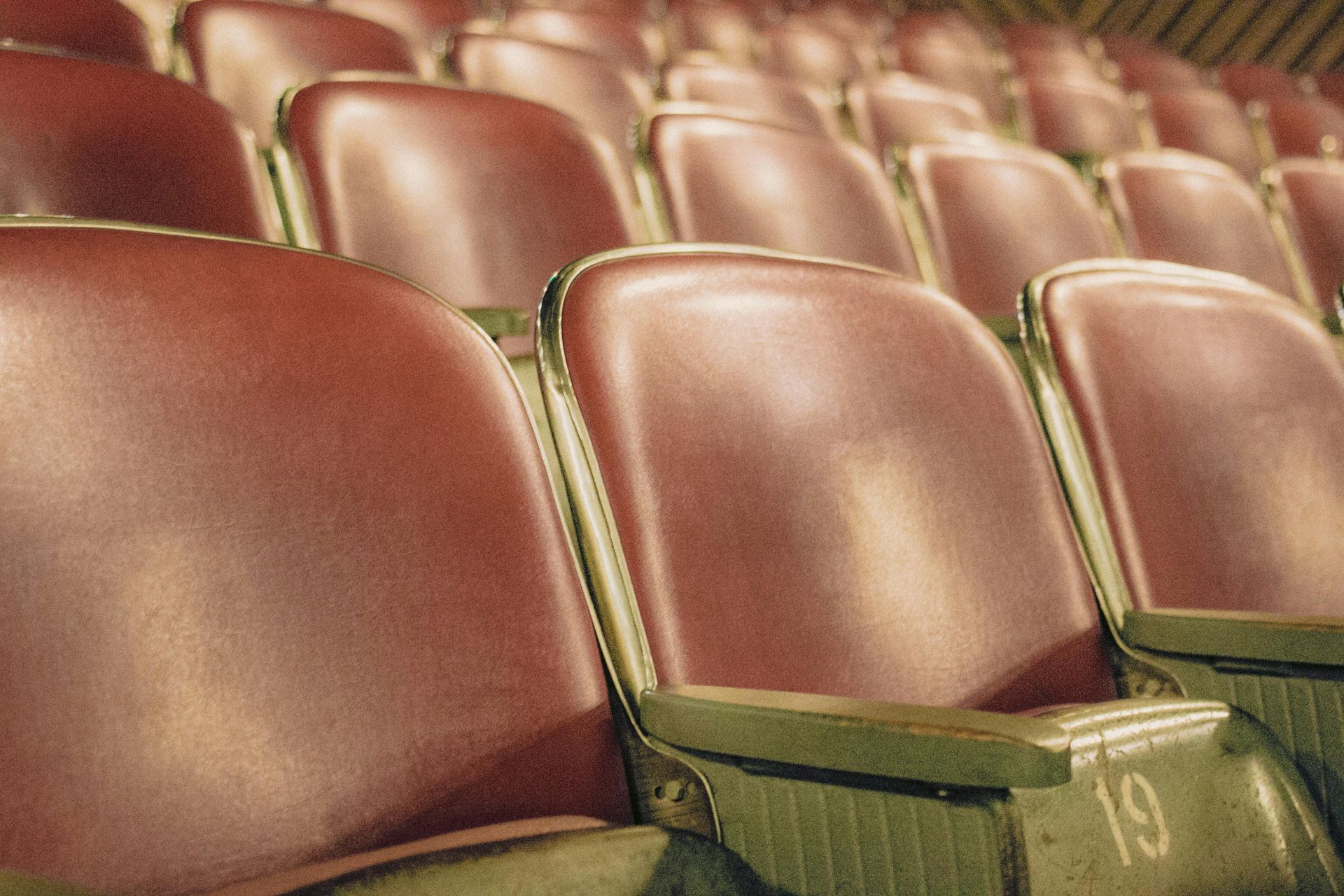 A row of empty seats with the number 19 on them