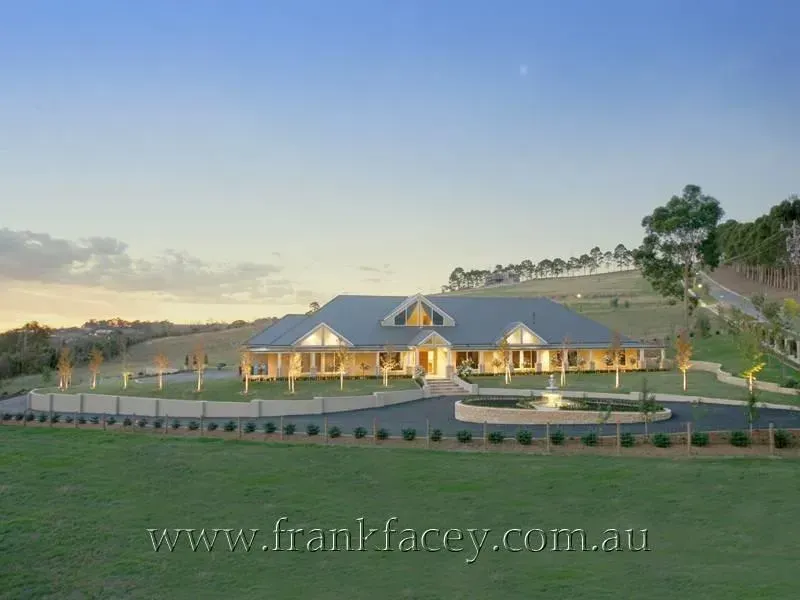 A Large House Sits in the Middle of a Lush Green Field | Warragul, VIC | ADI Building Services