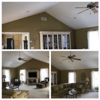 Living room with vaulted ceiling, olive walls, ceiling fans, and beige sectional sofa set