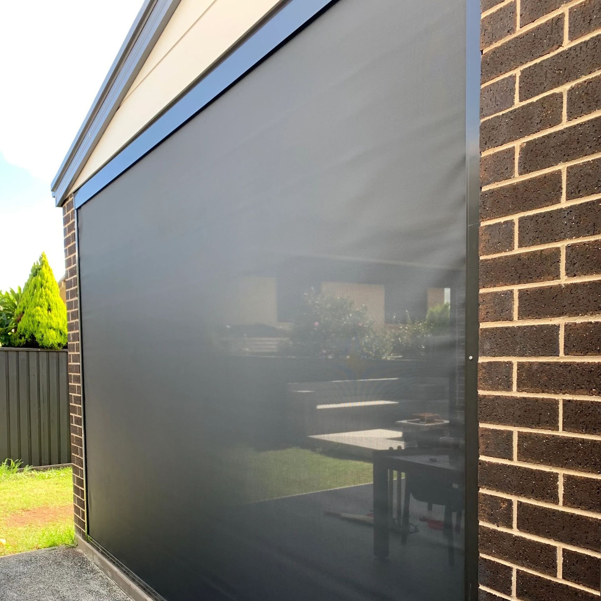 A Close up Of a Black Zipscreen on A House — Phoenix Blinds In Nowra, NSW