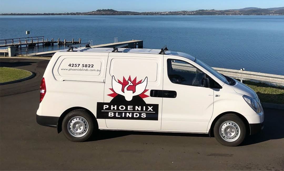 A Close up Of a Window with Blinds on It — Phoenix Blinds In Nowra, NSW