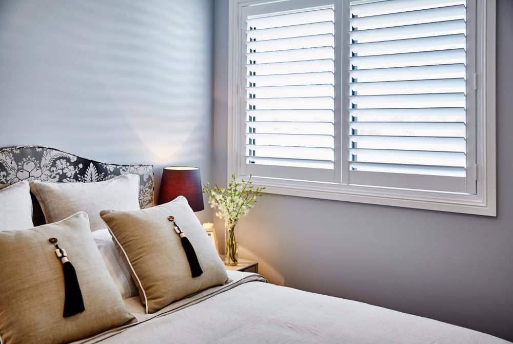 A Close up Of a Window with Blinds on It — Phoenix Blinds In Nowra, NSW