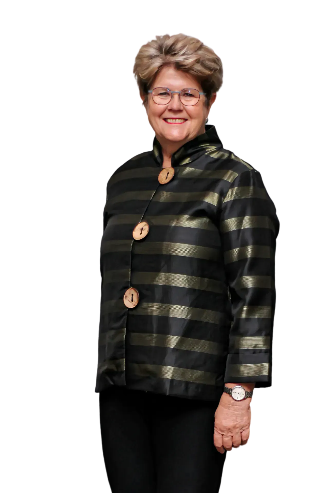 A person smiling while wearing a black and gold striped jacket with large buttons, isolated on a white background.